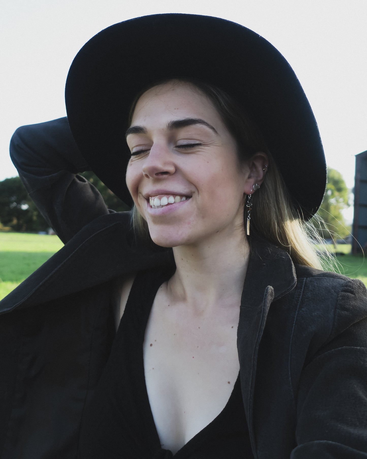 Earthen May squiggle, sparkle silver dangle earrings. Handmade, boho style.