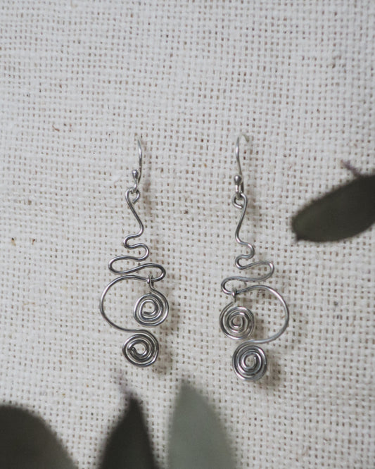 Earthen May Delicate, wire swirl Earrings. Handmade, sterling silver, funky.